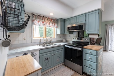 Experience easy, affordable lake living in the heart of Osage - photo 7