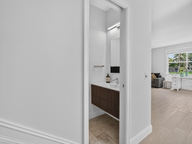Welcome to this stunning waterfront residence nestled in The - photo 18