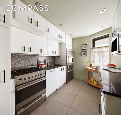 Welcome to this sun-drenched pre-war two-bedroom, one-bathroom - photo 8