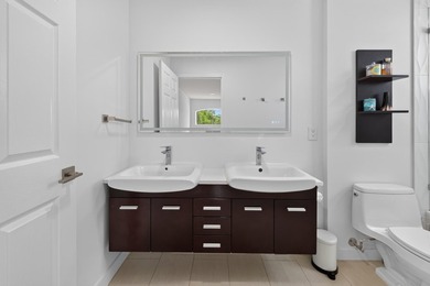 Welcome to this stunning waterfront residence nestled in The - photo 31