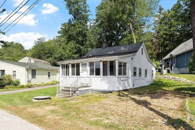 Tucked into a charming lake community, this property at 32 Ells - photo 3