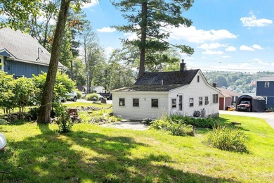 Tucked into a charming lake community, this property at 32 Ells - photo 4