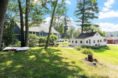 Tucked into a charming lake community, this property at 32 Ells - photo 5