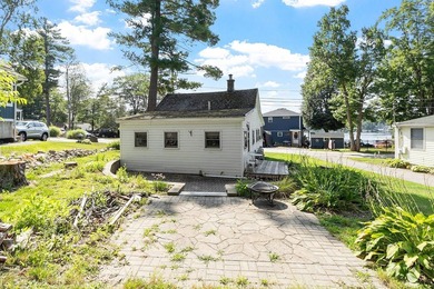Tucked into a charming lake community, this property at 32 Ells - photo 6
