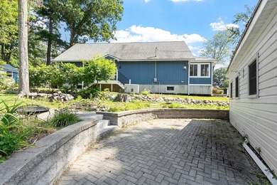 Tucked into a charming lake community, this property at 32 Ells - photo 7