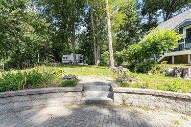 Tucked into a charming lake community, this property at 32 Ells - photo 8