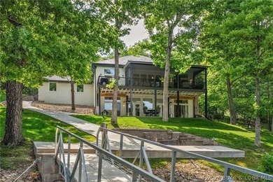 Tucked away in the prestigious Villages at Shawnee Bend, this - photo 2