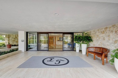 In town sophisticated waterfront luxury in Lake Towers. This - photo 13