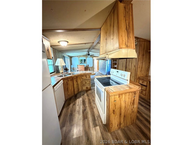Affordable Lake Living Opportunity in the desirable Osage - photo 6