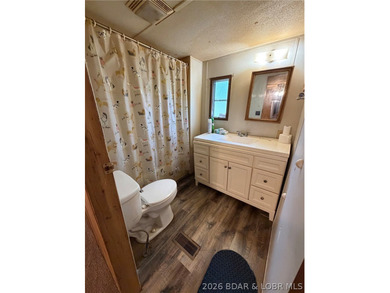 Affordable Lake Living Opportunity in the desirable Osage - photo 10