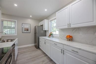 Welcome to 94 Cimarron Drive - a meticulously renovated, truly - photo 9