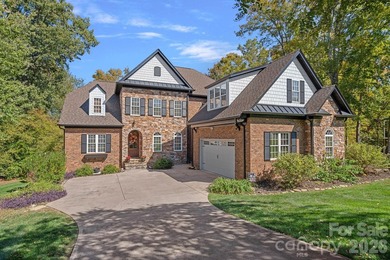 Tucked within the highly desirable Treetops at Cowans Ford - photo 1