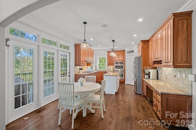 Tucked within the highly desirable Treetops at Cowans Ford - photo 7