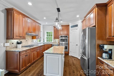 Tucked within the highly desirable Treetops at Cowans Ford - photo 8