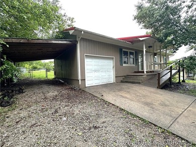 4-bed, 2-bath home in Warsaw featuring an open floor plan - photo 1