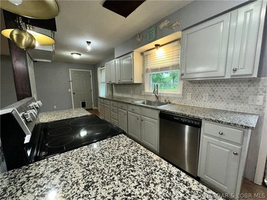 4-bed, 2-bath home in Warsaw featuring an open floor plan - photo 6