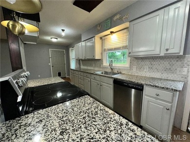 4-bed, 2-bath home in Warsaw featuring an open floor plan - photo 6