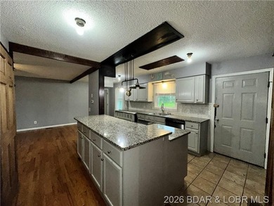 4-bed, 2-bath home in Warsaw featuring an open floor plan - photo 8