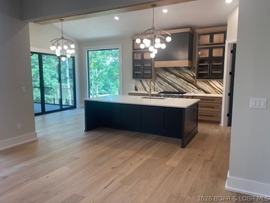 WOW Setting! New Construction! Sitting on over 1/2 an acre, this - photo 8