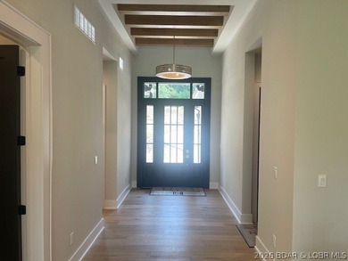 WOW Setting! New Construction! Sitting on over 1/2 an acre, this - photo 9