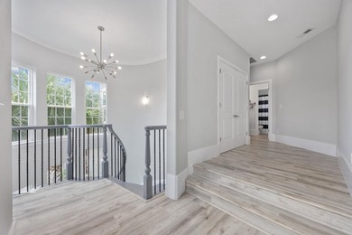 Discover luxury living at 914 Bluffview Dr. in The Bluffs on the - photo 15