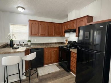 Own your own home in a quiet, well-maintained neighborhood! This - photo 2