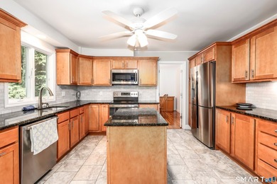 Nestled on a private, beautifully landscaped lot in the highly - photo 4