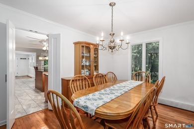 Nestled on a private, beautifully landscaped lot in the highly - photo 6