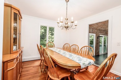 Nestled on a private, beautifully landscaped lot in the highly - photo 7