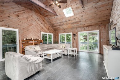 Nestled on a private, beautifully landscaped lot in the highly - photo 8
