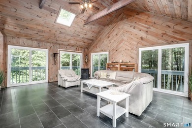 Nestled on a private, beautifully landscaped lot in the highly - photo 9
