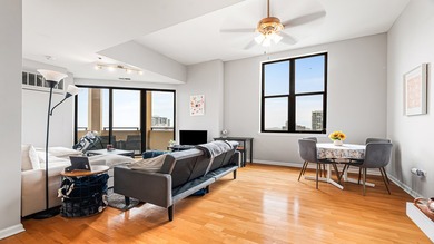 Rarely available high-floor, southeast-facing corner unit at The - photo 3