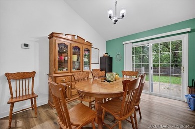 Escape to Lake of the Ozarks in this peaceful country setting - photo 12