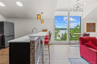 Experience the ultimate Lake of the Ozarks lifestyle in this - photo 7