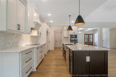 Welcome to this beautifully crafted 4 bedroom, 3 bath home