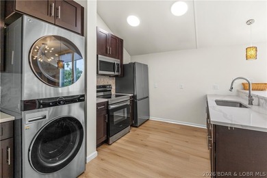 Experience the ultimate Lake of the Ozarks lifestyle in this - photo 9