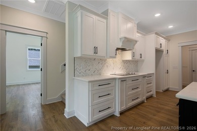 Welcome to this beautifully crafted 4 bedroom, 3 bath home