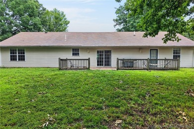 Escape to Lake of the Ozarks in this peaceful country setting - photo 29