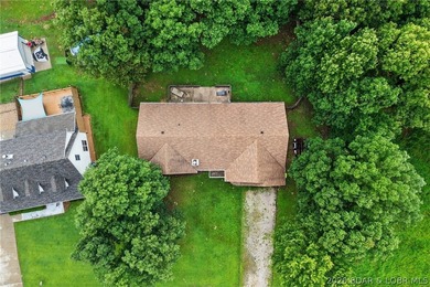 Escape to Lake of the Ozarks in this peaceful country setting - photo 35