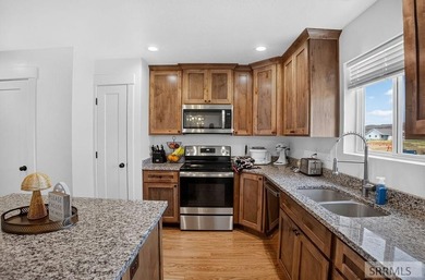 Welcome to 85 E Legacy Drive! Built in 2022, this immaculate - photo 8