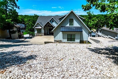The ultimate Lake of the Ozarks retreat awaits in prestigious - photo 21