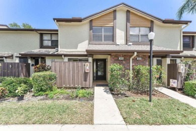 Lake Townhome/Townhouse For Sale in Coconut Creek, Florida