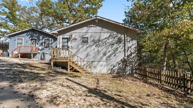 Discover peaceful lakefront living in this charming home tucked - photo 3