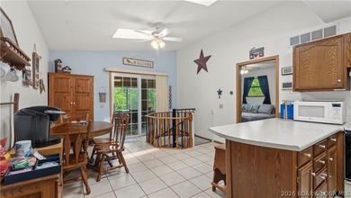 Discover peaceful lakefront living in this charming home tucked - photo 9