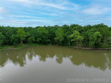Large Lake Front Lot with 230 ft of Lake Front and 1.3 Acres - photo 1