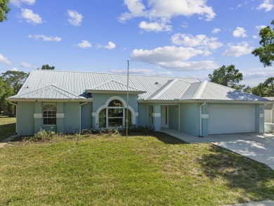 Lake Home For Sale in Micco, Florida