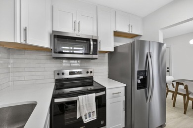 Stunning fully renovated corner-unit condo in a premier 55+ - photo 19