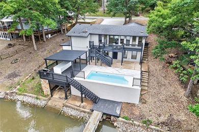 LAKE LIVING AT ITS FINEST! Spectacularly remodeled waterfront - photo 1