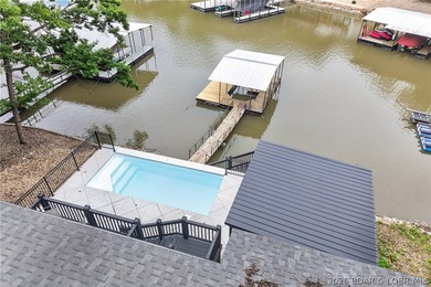 LAKE LIVING AT ITS FINEST! Spectacularly remodeled waterfront - photo 2