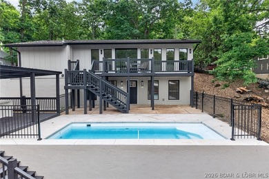 LAKE LIVING AT ITS FINEST! Spectacularly remodeled waterfront - photo 4